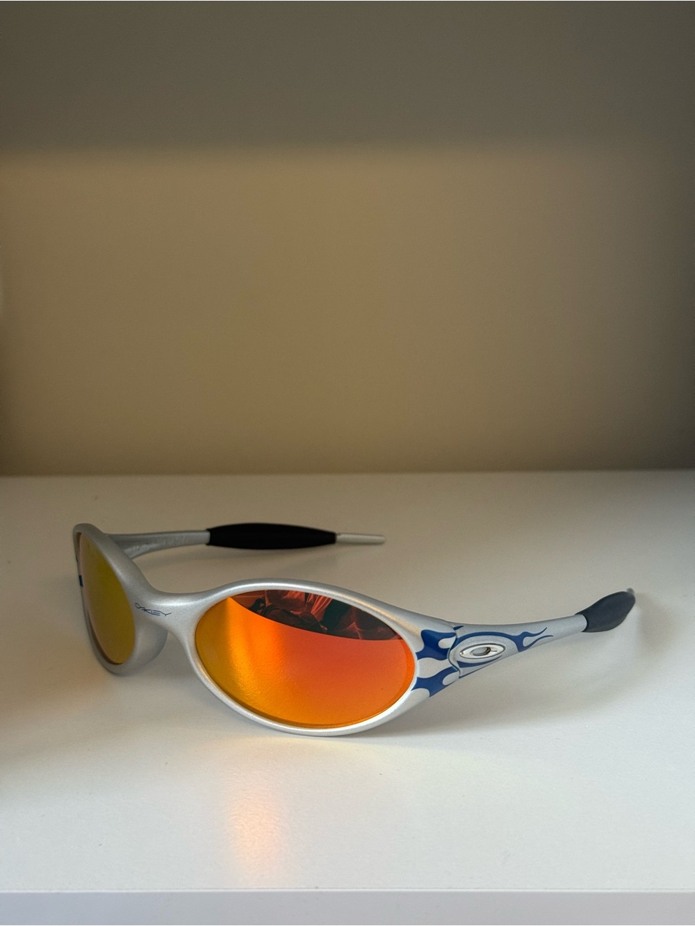 Oakley Style Silver Sunglasses with Blue Flame Temples and Orange Mirror Lenses
